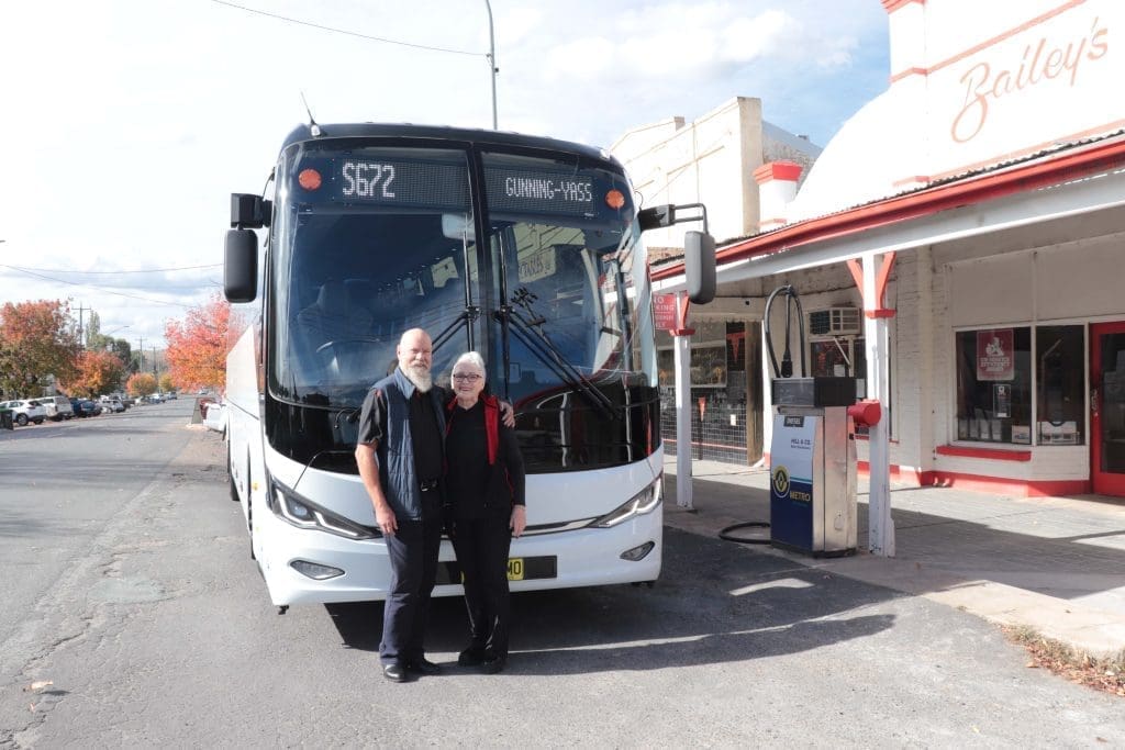 Sam and Craig Southwell standing next to their new Yutong C12 school bus outside Bailey’s Garage in Gunning, NSW.